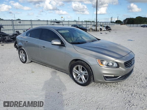 2015 Volvo S60 T5 Drive-E Premier Plus with VIN YV140MFC1F2302222, listed as a Copart auction lot 42749023 with 63,551 mi miles. Bid and sale history available at carsss.com. Image 4.