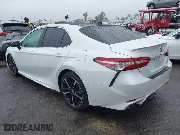 2018 Toyota Camry XSE with VIN 4T1BZ1HK8JU019394, listed as a IAAI auction lot 41492529 with 107,745 mi miles and . Bid and sale history available at DreamBid. Image 3.