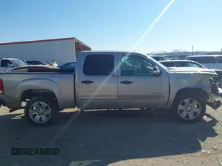 2008 GMC Sierra 1500 SLE1 z VIN 3GTEC13JX8G260212, wystawiony jako IAAI lot #41641592 z przebiegiem 186 365 mil mil oraz . Historia ofert i sprzedaży dostępna na DreamBid. Obrazek 13.