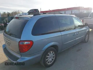 2003 Chrysler Town & Country LX with VIN 2C4GP44L73R238380, listed as a IAAI auction lot 41705420 with 129,225 mi miles and . Bid and sale history available at DreamBid. Image 13.