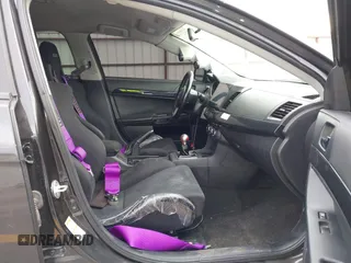 2013 Mitsubishi Lancer Evolution GSR with VIN JA32W8FV8DU012080, listed as a IAAI auction lot 41379744 with 95,070 mi miles. Bid and sale history available at carsss.com. Image 5.