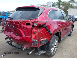 2019 Mazda CX-9 Grand Touring with VIN JM3TCBDY8K0333394, listed as a IAAI auction lot 42109778 with 58,887 mi miles and . Bid and sale history available at DreamBid. Image 4.