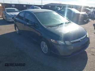 2007 Honda Civic z VIN JHMFA36217S024161, wystawiony jako IAAI lot #42185130 z przebiegiem 189 313 mil mil oraz . Historia ofert i sprzedaży dostępna na DreamBid. Obrazek 1.