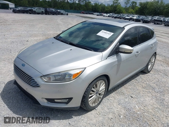 2018 Ford Focus Titanium with VIN 1FADP3N29JL232336, listed as a IAAI auction lot 42485243 with 82,113 mi miles and . Bid and sale history available at DreamBid. Image 2.