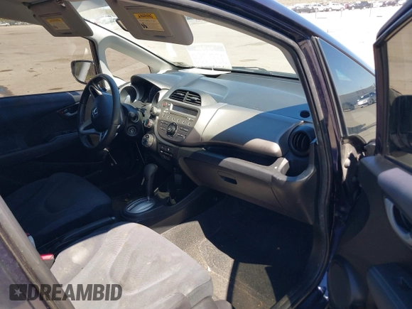 2009 Honda Fit Sport with VIN JHMGE88479S007307, listed as a IAAI auction lot 41801827 with 212,998 mi miles. Bid and sale history available at carsss.com. Image 5.