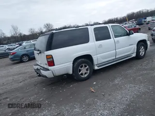 2006 GMC Yukon XL Denali with VIN 1GKFK66U86J133629, listed as a IAAI auction lot 41094116 with 208,665 mi miles. Bid and sale history available at carsss.com. Image 4.