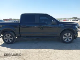 2018 Ford F-150 XL with VIN 1FTEW1E50JKE13640, listed as a IAAI auction lot 41228537 with 146,927 mi miles. Bid and sale history available at carsss.com. Image 13.