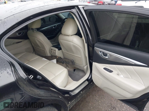 2014 Infiniti Q50 Premium z VIN JN1BV7AR2EM705630, wystawiony jako IAAI lot #42258650 z przebiegiem 109 151 mil mil oraz . Historia ofert i sprzedaży dostępna na DreamBid. Obrazek 8.