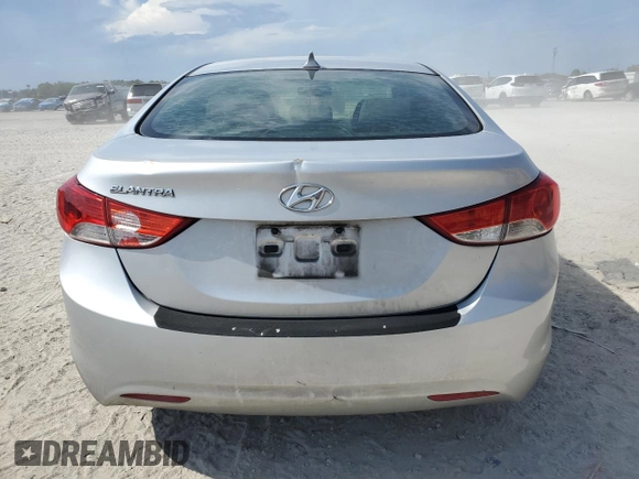 2013 Hyundai Elantra GLS z VIN KMHDH4AE5DU515615, wystawiony jako Copart lot #60572725 z przebiegiem 243 549 mil mil oraz Szkoda całkowita • Salvage title. Historia ofert i sprzedaży dostępna na DreamBid. Obrazek 6.