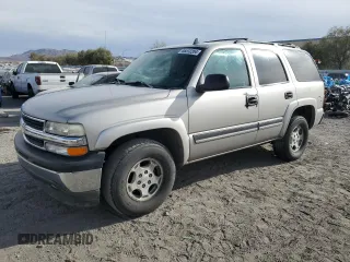2006 Chevrolet Tahoe LS with VIN 1GNEC13VX6R117879, listed as a Copart auction lot 86512204 with 214,217 mi miles and Salvage Title. Bid and sale history available at carsss.com. Image 1.