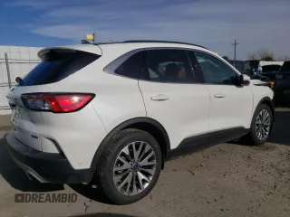 2020 Ford Escape Titanium Hybrid z VIN 1FMCU9DZXLUC07311, wystawiony jako Copart lot #48085815 z przebiegiem 50 472 mil mil oraz Szkoda całkowita • Salvage title. Historia ofert i sprzedaży dostępna na DreamBid. Obrazek 3.