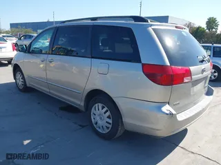 2004 Toyota Sienna CE with VIN 5TDZA23CX4S210033, listed as a IAAI auction lot 42086059 with 271,521 mi miles. Bid and sale history available at carsss.com. Image 3.