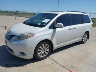 2015 Toyota Sienna XLE with VIN 5TDYK3DC8FS666113, listed as a IAAI auction lot 41999037 with 179,566 mi miles and . Bid and sale history available at carsss.com. Image 2.
