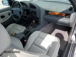 1997 BMW 3-Series 328IC with VIN WBABK832XVET96413, listed as a Copart auction lot 47806025 with 66,051 mi miles and Salvage Title. Bid and sale history available at carsss.com. Image 8.