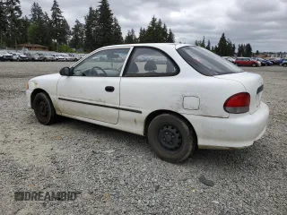 1999 Hyundai Accent z VIN KMHVD14N9XU503210, wystawiony jako Copart lot #56486325 z przebiegiem 195 501 mil mil oraz Szkody całkowita. Historia ofert i sprzedaży dostępna na DreamBid. Obrazek 2.