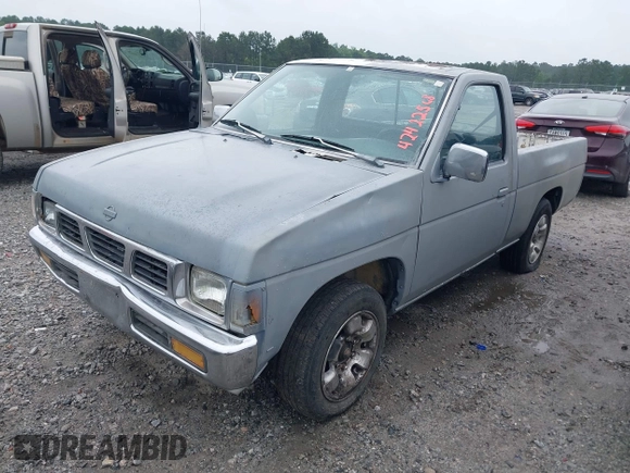 1996 Nissan Frontier XE z VIN 1N6SD11SXTC351243, wystawiony jako IAAI lot #42422568 z przebiegiem 265 304 mil mil oraz . Historia ofert i sprzedaży dostępna na DreamBid. Obrazek 2.