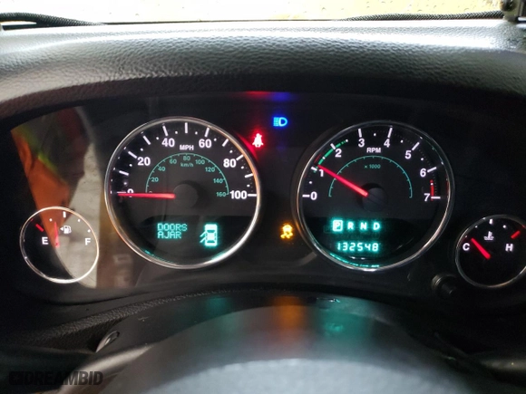 2012 Jeep Wrangler Unlimited Sahara with VIN 1C4BJWEG5CL281584, listed as a Copart auction lot 50982655 with 132,548 mi miles and Salvage Title. Bid and sale history available at carsss.com. Image 9.