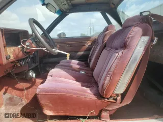 1982 Chevrolet El Camino with VIN 1GCCW80HXCR198571, listed as a Copart auction lot 77004474 with 70,899 mi miles and Salvage Title. Bid and sale history available at carsss.com. Image 7.