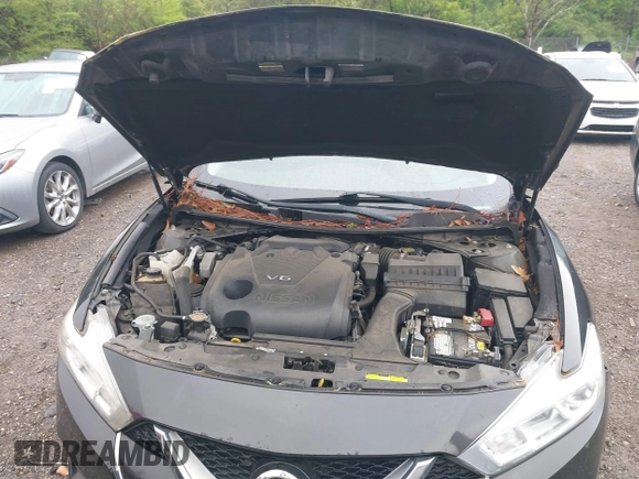 2016 Nissan Maxima SL z VIN 1N4AA6AP0GC420386, wystawiony jako IAAI lot #41981213 z przebiegiem 134 266 mil mil oraz . Historia ofert i sprzedaży dostępna na DreamBid. Obrazek 10.