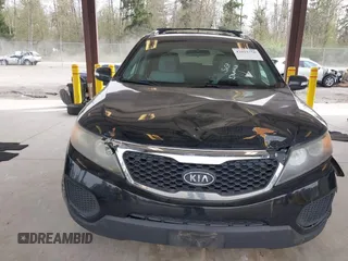 2011 Kia Sorento LX with VIN 5XYKTDA24BG170561, listed as a IAAI auction lot 42011756 with 211,833 mi miles. Bid and sale history available at carsss.com. Image 12.
