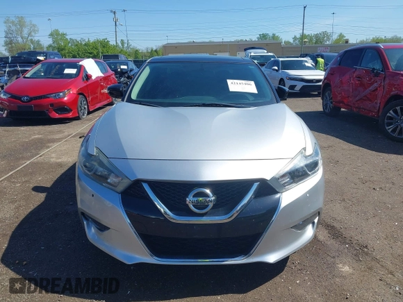 2018 Nissan Maxima SR with VIN 1N4AA6AP3JC374804, listed as a IAAI auction lot 42145406 with 136,757 mi miles. Bid and sale history available at carsss.com. Image 13.