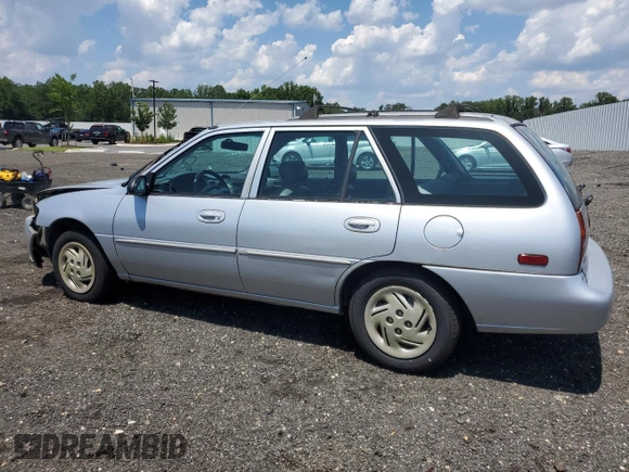 1998 Ford Escort SE with VIN 3FAFP15P4WR240362, listed as a Copart auction lot 63453095 with 220,855 mi miles and Salvage title. Bid and sale history available at DreamBid. Image 2.