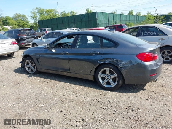 2015 BMW 4 Series 428i xDrive with VIN WBA4C9C55FD331921, listed as a IAAI auction lot 42214901 with 94,970 mi miles and . Bid and sale history available at DreamBid. Image 15.