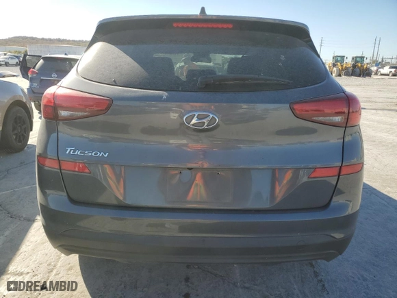 2019 Hyundai Tucson SE with VIN KM8J23A41KU945578, listed as a Copart auction lot 77248584 with 69,359 mi miles and Salvage Title. Bid and sale history available at carsss.com. Image 6.