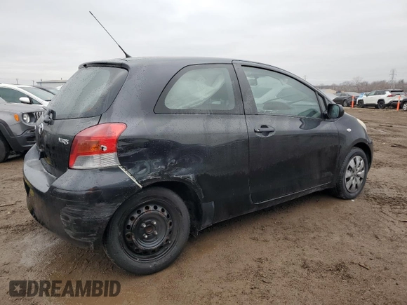 2011 Toyota Yaris with VIN JTDJT4K37B5339113, listed as a Copart auction lot 82474554 with 148,800 mi miles and Salvage Title. Bid and sale history available at carsss.com. Image 3.