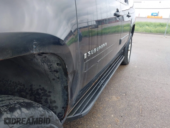 2007 Chevrolet Suburban LT с VIN 1GNFK163X7J201279, выставлен на аукционе IAAI как лот 42459143 с пробегом 166 987 миль миль и . История ставок и продаж доступна на DreamBid. Изображение 13.