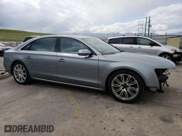 2013 Audi A8 3.0L with VIN WAURGAFD2DN026253, listed as a Copart auction lot 55476795 with 133,083 mi miles and Salvage title. Bid and sale history available at DreamBid. Image 4.