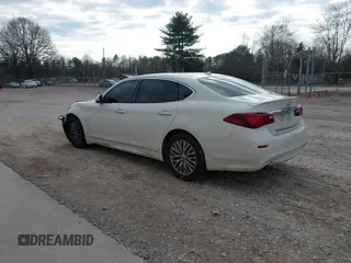2015 Infiniti Q70 with VIN JN1BY1PP5FM601628, listed as a IAAI auction lot 41510075 with 102,363 mi miles and . Bid and sale history available at DreamBid. Image 3.