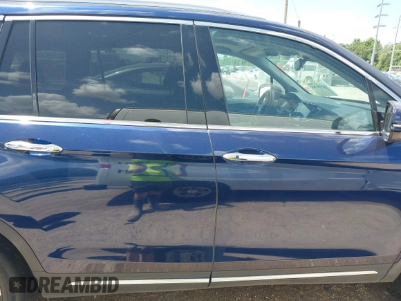2022 Honda Pilot Touring 7-Passenger with VIN 5FNYF5H61NB019768, listed as a IAAI auction lot 42438780 with Not provided miles and . Bid and sale history available at DreamBid. Image 14.