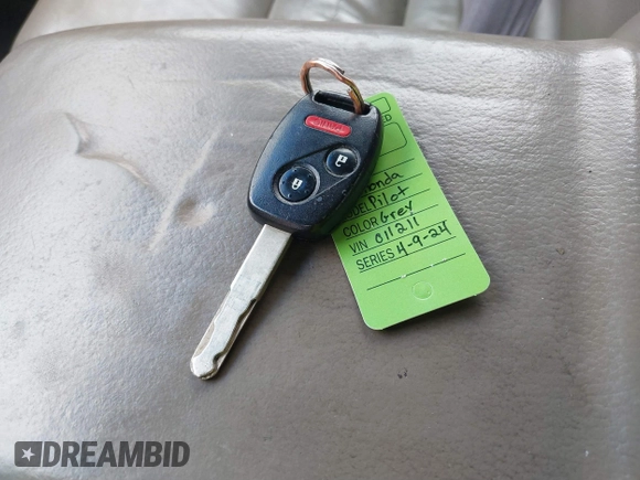 2006 Honda Pilot EX-L with VIN 5FNYF18776B011211, listed as a IAAI auction lot 39555749 with 295,998 mi miles and . Bid and sale history available at DreamBid. Image 11.