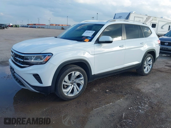 2021 Volkswagen Atlas SEL with VIN 1V2BR2CAXMC522670, listed as a IAAI auction lot 42110724 with 58,802 mi miles and . Bid and sale history available at DreamBid. Image 2.