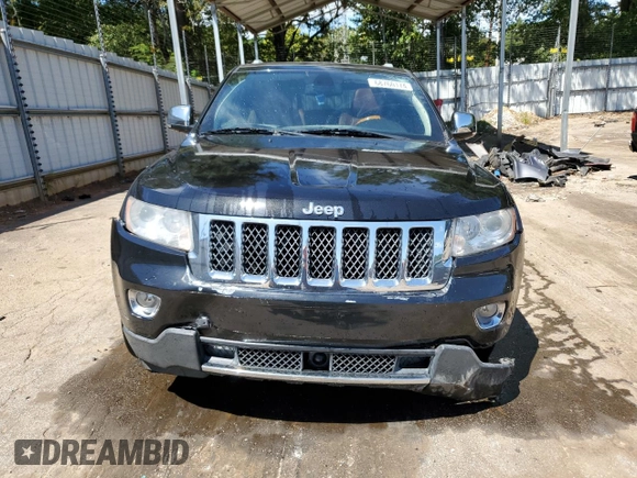 2012 Jeep Grand Cherokee Overland with VIN 1C4RJECTXCC227769, listed as a Copart auction lot 68760174 with 144,537 mi miles and Salvage Title. Bid and sale history available at carsss.com. Image 5.
