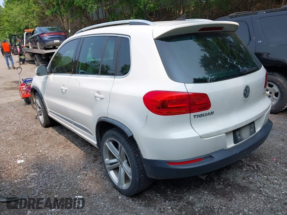 2014 Volkswagen Tiguan SEL with VIN WVGAV3AX7EW022239, listed as a IAAI auction lot 42381670 with 180,729 mi miles and . Bid and sale history available at DreamBid. Image 3.