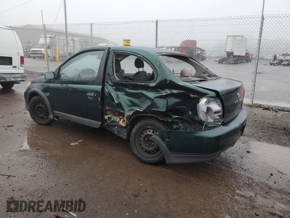 2000 Toyota ECHO with VIN JTDAT1231Y0041399, listed as a Copart auction lot 83774514 with 128,465 mi miles and Salvage Title. Bid and sale history available at DreamBid. Image 2.