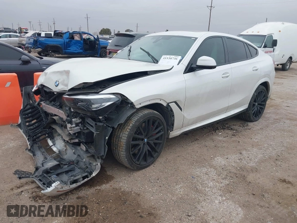 2021 BMW X6 M50i z VIN 5UXCY8C01M9E51506, wystawiony jako IAAI lot #41538726 z przebiegiem Nie podano mil oraz . Historia ofert i sprzedaży dostępna na DreamBid. Obrazek 17.