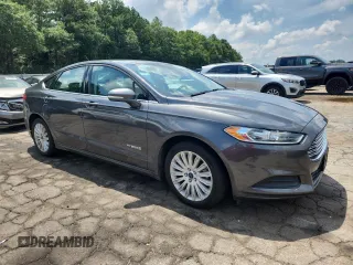 2015 Ford Fusion SE Hybrid with VIN 3FA6P0LU2FR206780, listed as a Copart auction lot 62839085 with 113,567 mi miles and Clean title. Bid and sale history available at DreamBid. Image 4.