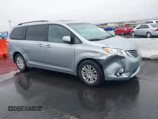 2011 Toyota Sienna XLE AAS with VIN 5TDYK3DC5BS111467, listed as a IAAI auction lot 41560895 with 126,917 mi miles. Bid and sale history available at carsss.com. Image 1.