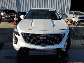 2023 Cadillac XT4 AWD Luxury with VIN 1GYFZBR42PF103438, listed as a Copart auction lot 80647064 with 18,182 mi miles and Salvage Title. Bid and sale history available at carsss.com. Image 5.