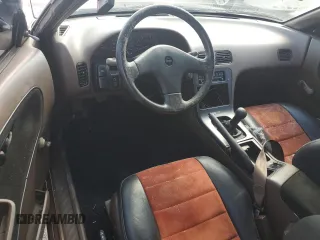 1991 Nissan 240SX z VIN JN1MS34PXMW001053, wystawiony jako Copart lot #79007744 z przebiegiem 172 425 mil mil oraz Nie do naprawy. Historia ofert i sprzedaży dostępna na DreamBid. Obrazek 8.