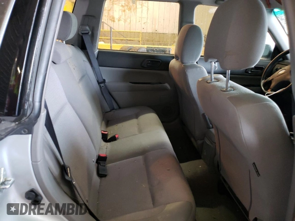 2003 Subaru Forester X with VIN JF1SG63683H766576, listed as a Copart auction lot 56979463 with 147,512 mi miles and Salvage Title. Bid and sale history available at carsss.com. Image 10.