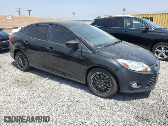 2012 Ford Focus SE with VIN 1FAHP3F22CL372232, listed as a Copart auction lot 59637645 with 134,337 mi miles and Salvage title. Bid and sale history available at DreamBid. Image 4.