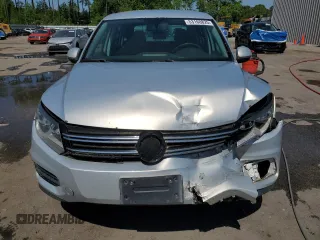 2012 Volkswagen Tiguan SE z VIN WVGAV7AX6CW543053, wystawiony jako Copart lot #53160825 z przebiegiem 167 185 mil mil oraz Szkody całkowita. Historia ofert i sprzedaży dostępna na DreamBid. Obrazek 12.