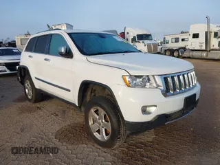 2013 Jeep Grand Cherokee Overland with VIN 1C4RJFCT1DC525098, listed as a IAAI auction lot 41593500 with 80,412 mi miles. Bid and sale history available at carsss.com. Image 1.