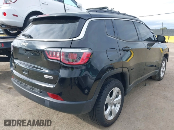 2018 Jeep Compass Altitude with VIN 3C4NJDBB0JT484409, listed as a IAAI auction lot 41656179 with 85,436 mi miles and . Bid and sale history available at carsss.com. Image 4.