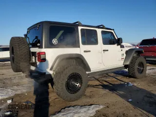 2018 Jeep Wrangler Unlimited Rubicon with VIN 1C4HJXFG8JW104425, listed as a Copart auction lot 87545965 with 62,988 mi miles and Salvage title. Bid and sale history available at DreamBid. Image 3.