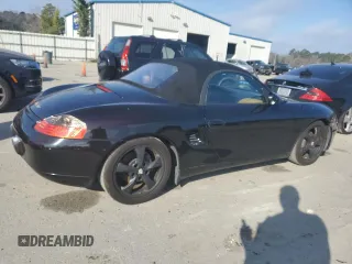 2001 Porsche Boxster z VIN WP0CA29881U625688, wystawiony jako Copart lot #43983695 z przebiegiem Nie podano mil oraz Szkoda całkowita • Salvage title. Historia ofert i sprzedaży dostępna na DreamBid. Obrazek 3.